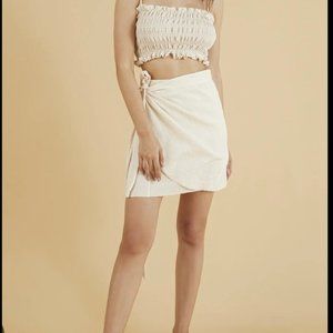 The Handloom Los Angeles Mini Lyra Wrap Skirt in Natural